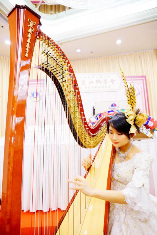 Harpist Lisa performs at Lions Event